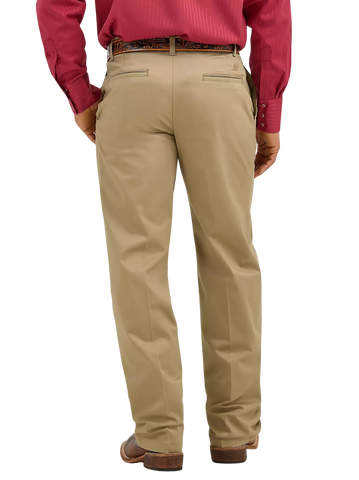 Men's tan flat front dress pant back view with double welt pockets and relaxed fit, styled with western boots and tooled leather belt — Blair's Western Wear Marble Falls TX