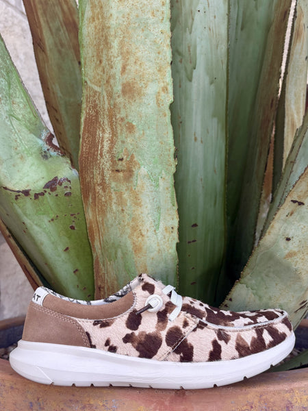 Agave backdrop, full side — cowhide print, white toggle lace, tan suede collar, white FLX Foam sole