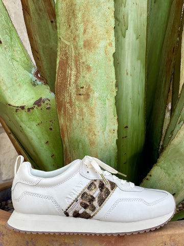 Full side profile — white leather, leopard stripe, gum sole