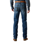 Men's dark blue slim straight jeans with faded seat, angular contrasting back-pocket stitching and full-length legs — Blair's Western Wear Marble Falls TX