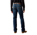 Men's dark blue relaxed bootcut jeans with warm-toned back-pocket stitching, faded seat and full-length legs — Blair's Western Wear Marble Falls TX
