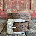 Brown leather floral tooled belt with dark scroll accents, tonal stitching and an engraved silver-tone buckle — Blair's Western Wear Marble Falls TX