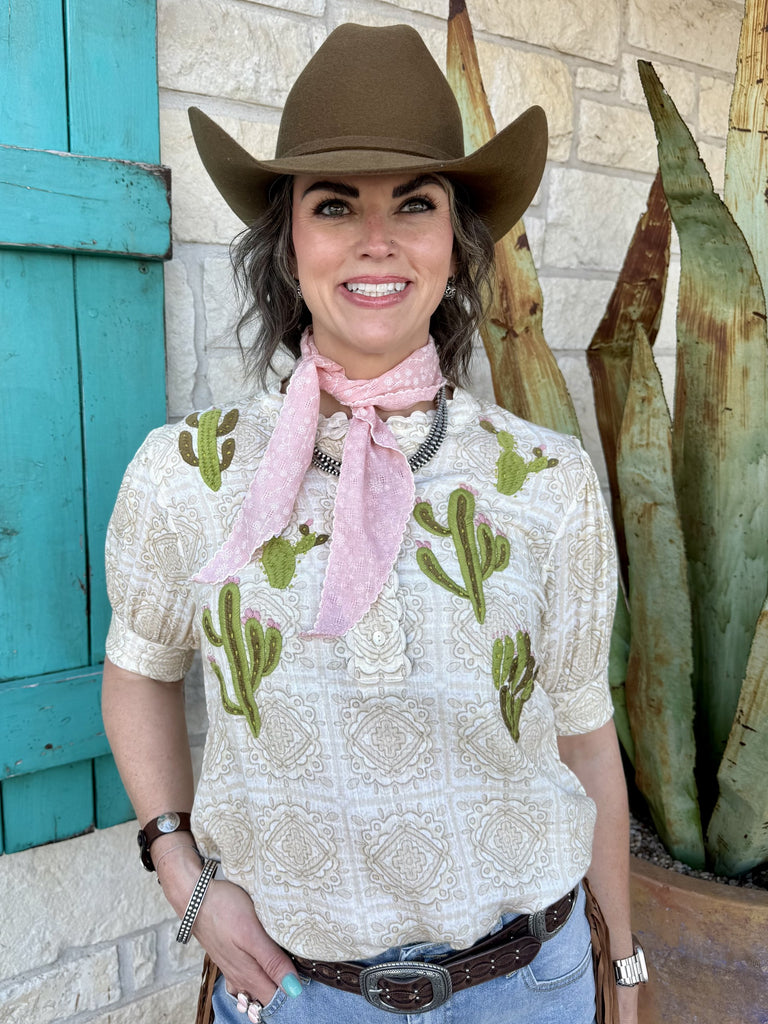Women’s Ivy Jane blouse embroidered cactus top in cream and green, lightweight Western-style fabric with puff sleeves - Ivy Jane NOPAL. Available at Blair's Western Wear, Marble Falls, TX.