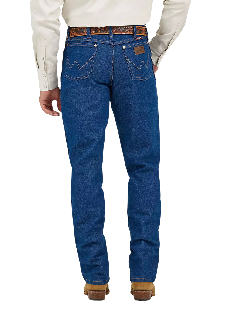 Men's Wrangler Cowboy Cut relaxed fit prewashed blue denim jean with classic five-pocket Western styling and boot-cut leg — Blair's Western Wear Marble Falls TX