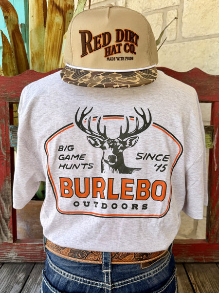 Men's heather oat Burlebo Outdoors Big Game Hunts short sleeve tee with bold orange black white full-rack buck badge back graphic Big Game Hunts Since 15 and BURLEBO OUTDOORS text, back view styled with jeans and tooled leather belt — Blair's Western Wear Marble Falls TX