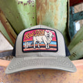 Olive cap with colorful rectangular Brahman cattle patch, black edging and dark bill stitching — Blair's Western Wear Marble Falls TX