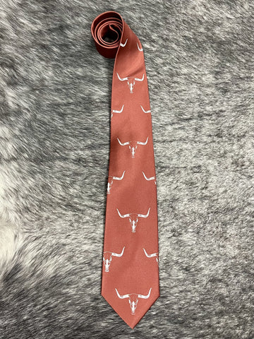 Men's cinnamon terracotta satin necktie with repeating white longhorn steer skull novelty print, smooth finish, standard width pointed tip — Blair's Western Wear Marble Falls TX