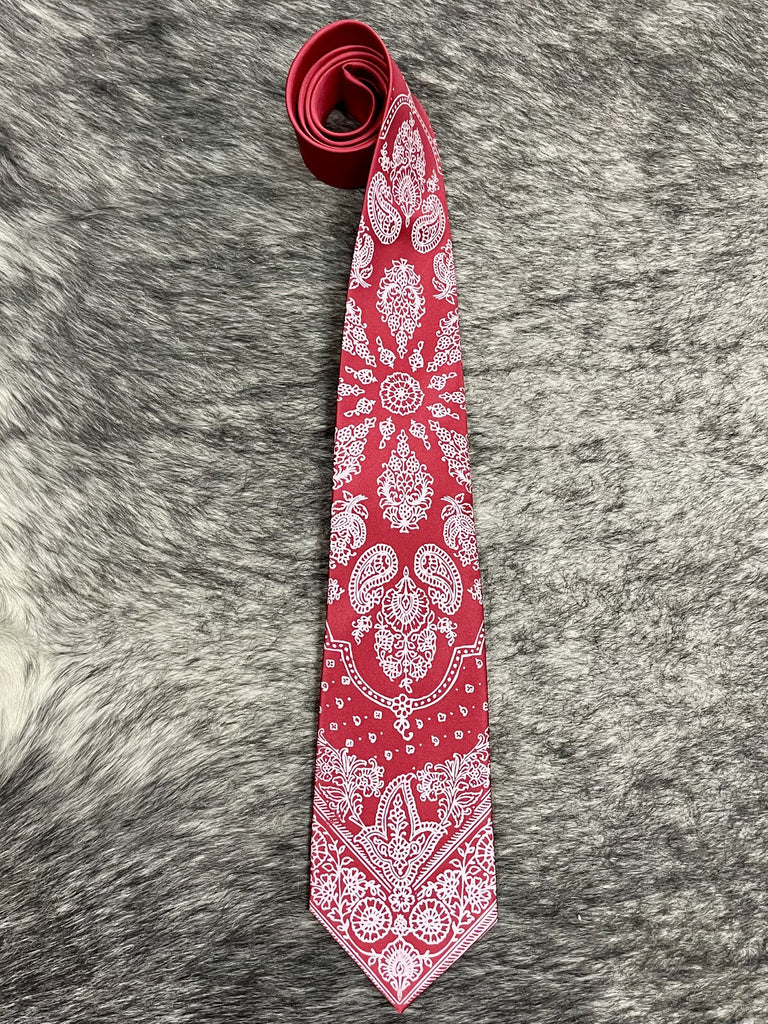 Men's bold red satin necktie with allover white bandana-inspired paisley and floral medallion print, smooth finish, standard width pointed tip — Blair's Western Wear Marble Falls TX