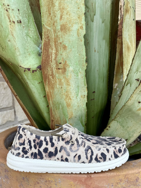 Tan and black leopard-print suede slip-on shoe with a low-profile silhouette and flexible sole — Blair's Western Wear Marble Falls TX