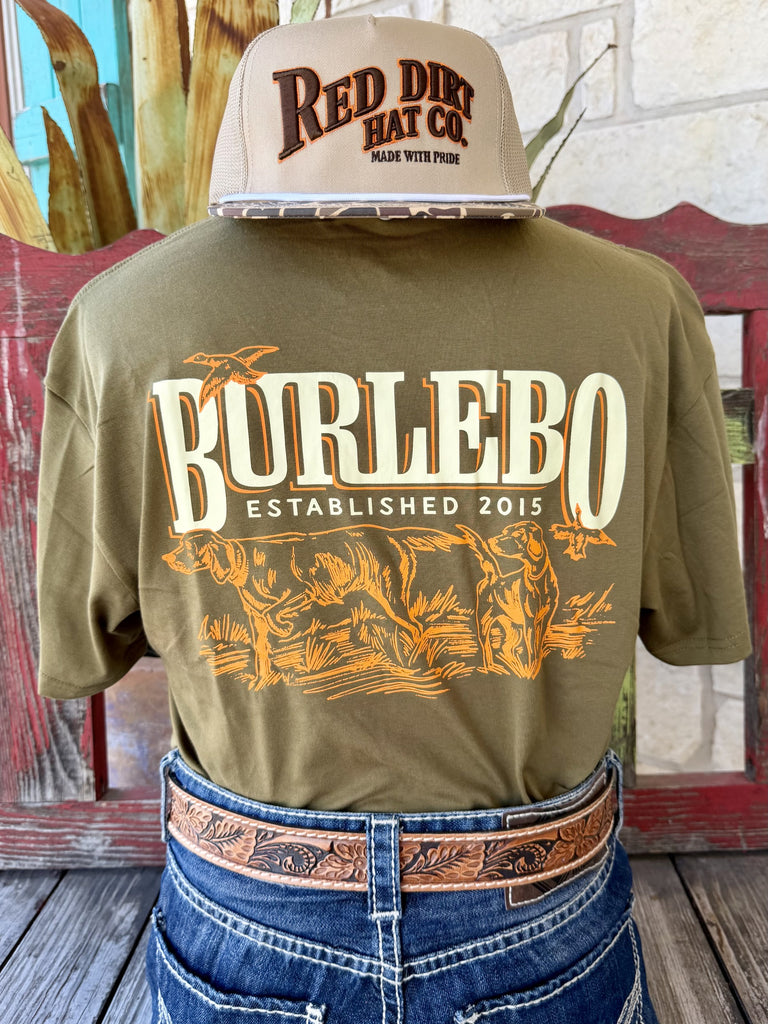 Men's olive green Burlebo Bird Pointer Hunting short sleeve tee with bold orange cream two bird dogs on point ducks flushing back graphic and Burlebo Established 2015 banner, back view styled with jeans and tooled leather belt — Blair's Western Wear Marble Falls TX
