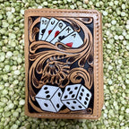 Men's Trifold Poker Dice Wallet 18FKW096T - Blair's Western Wear Marble Falls TX
Alt text: Tan leather trifold wallet with floral-scroll tooling, white playing cards with red and black suits, and two white dice against black accents — Blair's Western Wear Marble Falls TX