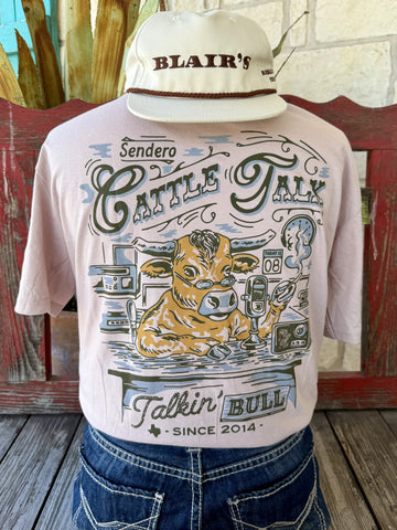 Men's lavender Sendero Provisions Co. Cattle Talk short sleeve tee with olive tan Talkin' Bull Sendero chest badge featuring longhorn bull illustration, front view styled with jeans and tooled leather belt — Blair's Western Wear Marble Falls TX
