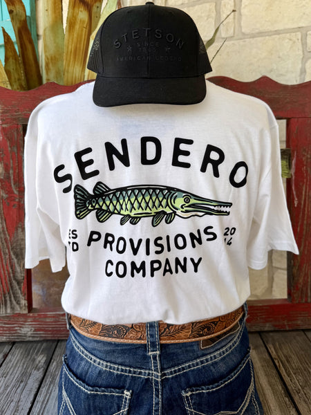 Men's white Sendero Provisions Co. Alligator Gar short sleeve tee with green black alligator gar fish chest logo and Sendero Provisions Co. text, front view styled with jeans and tooled leather belt — Blair's Western Wear Marble Falls TX