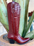 Women's glossy deep red croc-print Western boot with tall shaft, pull tab, pointed toe, black angled heel, and black sole — Blair's Western Wear Marble Falls TX