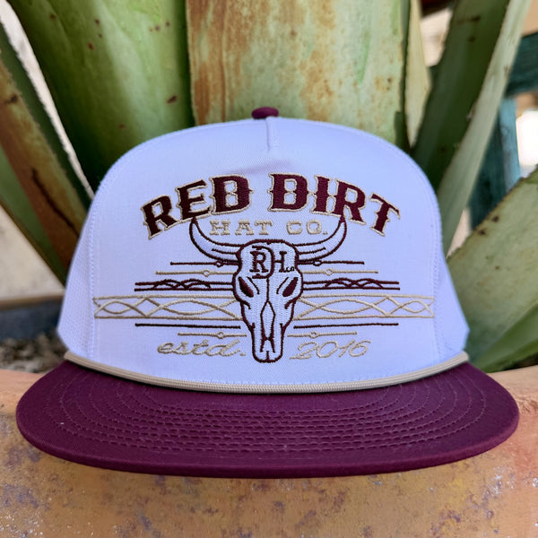 Men's white Red Dirt Hat Co. AZ Spirit mesh trucker cap side view showing white mesh back wine maroon flat brim and tan rope accent — Blair's Western Wear Marble Falls TX