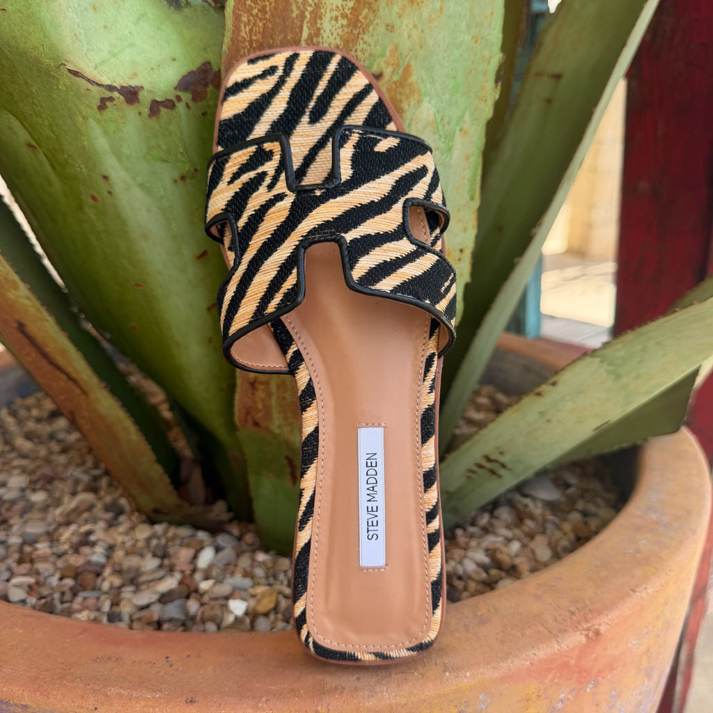 "Women's brown and natural zebra-print slide with cushioned footbed and slip-on silhouette — Blair's Western Wear Marble Falls TX"