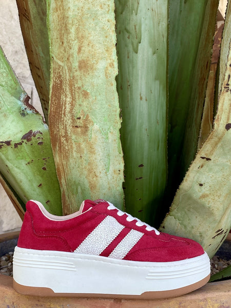 Women's red suede platform sneaker with white crackle-finish side stripe, red center accent stripe, white laces, round toe, chunky white platform sole, and tan gum rubber outsole — Blair's Western Wear Marble Falls TX