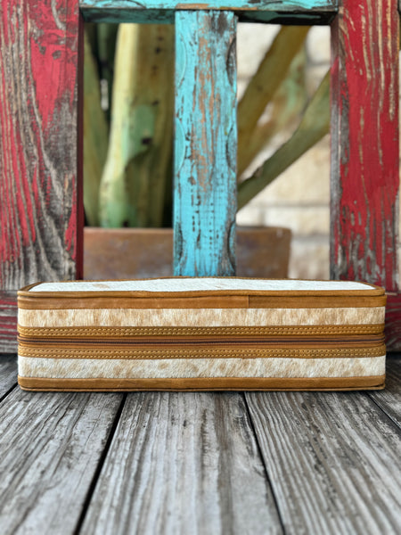 Women’s American Darling jewelry case in brown and white hair-on cowhide, with full-grain leather trim and dual-zip closure for secure, organized storage - ADBGA707B. Available at Blair’s Western Wear, Marble Falls, TX.