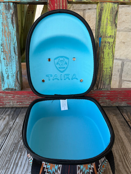 Keep your favorite caps safe and travel-ready with the Ariat Cap Carrier A3099897. Designed in a bold brown, black, and turquoise Aztec pattern, this sturdy case holds 4–6 caps without losing their shape. Perfect for rodeos, road trips, or everyday storage—stylish, practical, and built the Ariat way.Available at BLAIR'S Western Wear located in Marble Falls TX.