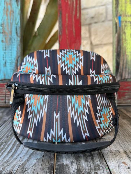 Keep your favorite caps safe and travel-ready with the Ariat Cap Carrier A3099897. Designed in a bold brown, black, and turquoise Aztec pattern, this sturdy case holds 4–6 caps without losing their shape. Perfect for rodeos, road trips, or everyday storage—stylish, practical, and built the Ariat way.Available at BLAIR'S Western Wear located in Marble Falls TX.
