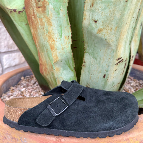 Birkenstock Clog Closed-Toe Boston in Black, crafted from soft suede that molds to your foot over time, with a contoured cork-latex footbed featuring an integrated soft foam layer for cushioned support – 0660473. Available at Blair's Western Wear, Marble Falls, TX.