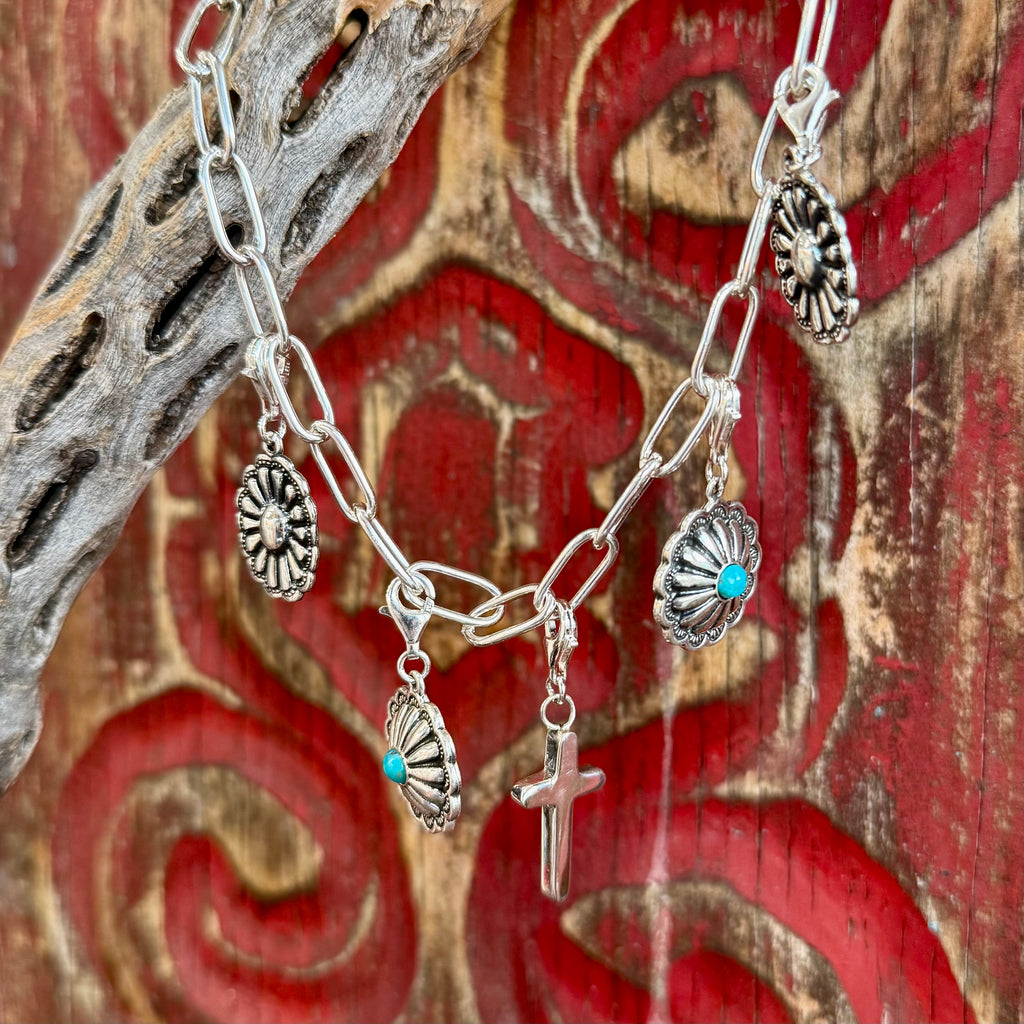 Boho charm necklace with silver concho charms and turquoise accents in silver/turquoise, featuring raised concho detailing, with a lightweight large-link chain design - BOCHARM5. Available at Blair's Western Wear, Marble Falls, TX.