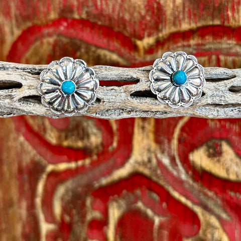 Boho Sol flower post earrings in silver and turquoise, featuring a detailed concho-style floral design, with a turquoise stone centerpiece for added color and contrast - T1370. Available at Blair's Western Wear, Marble Falls, TX.