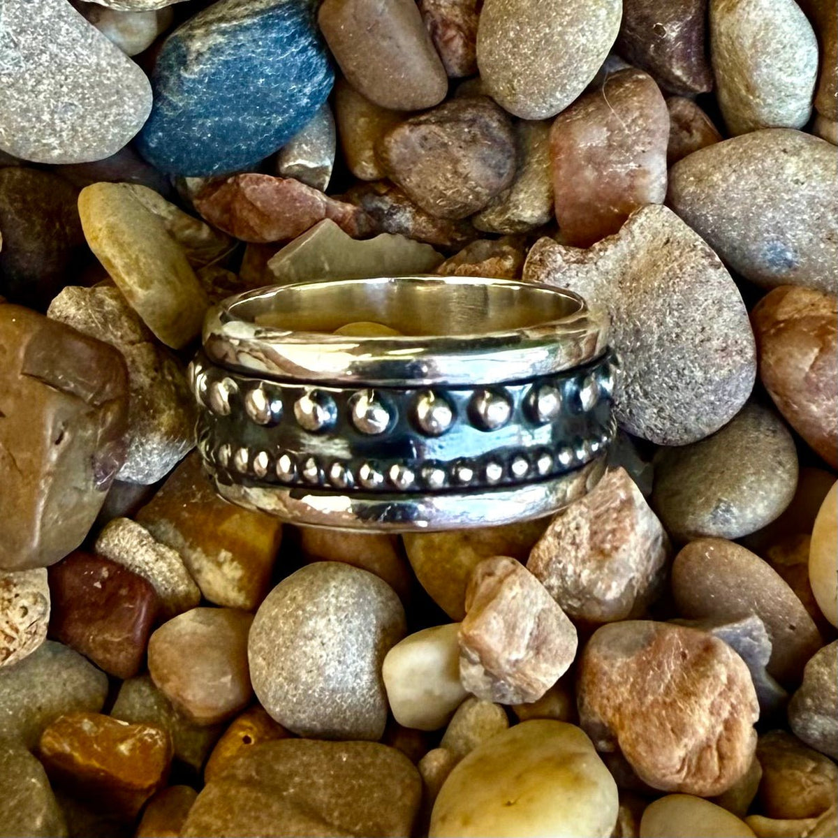 Boho Sol silver spinner ring in silver, featuring a smooth-spinning center band, with raised beaded detailing for added texture – T5302. Available at Blair's Western Wear, Marble Falls, TX.