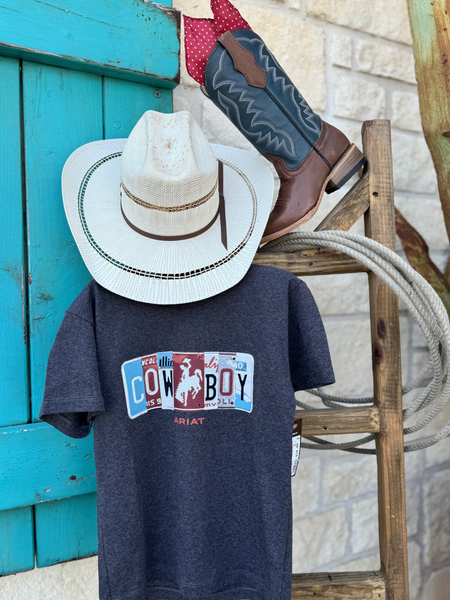 Boy's charcoal gray t-shirt with a license plate graphic that says cowboy.  Available at Blair's Western Wear, Marble Falls, TX.