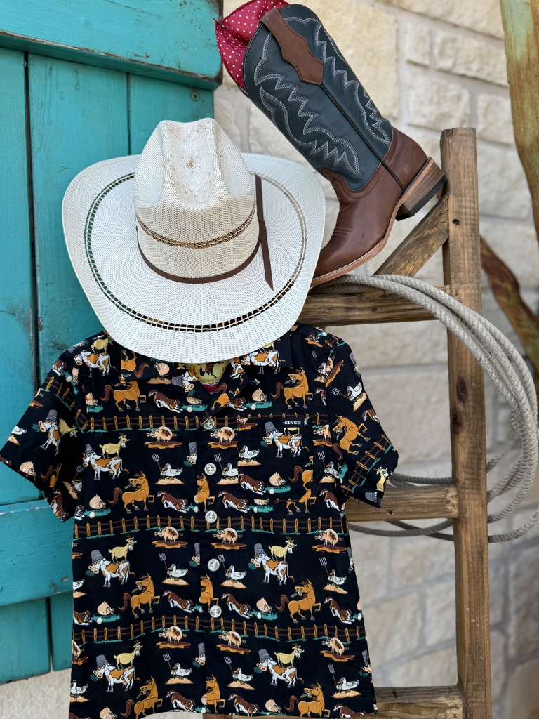 Boy's Short Sleeve Cinch Shirt (MTW7170003) . This black shirt features lots of fun farm cartoon animals. Available at Blair's Western Wear located in Marble Falls, TX. 