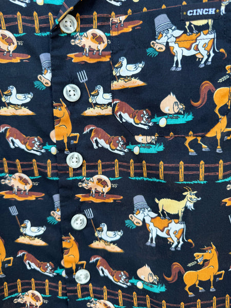 Close up of Boy's Short Sleeve Cinch Shirt (MTW7170003) . This black shirt features lots of fun farm cartoon animals. Available at Blair's Western Wear located in Marble Falls, TX. 