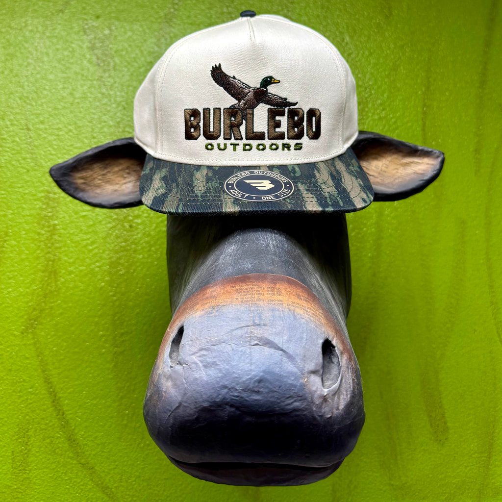 Burlebo snapback cap in cream and camo, embroidered mallard duck and logo for bold outdoor identity, with adjustable snapback closure for a secure custom fit - CMDMID. Available at Blair's Western Wear, Marble Falls, TX.