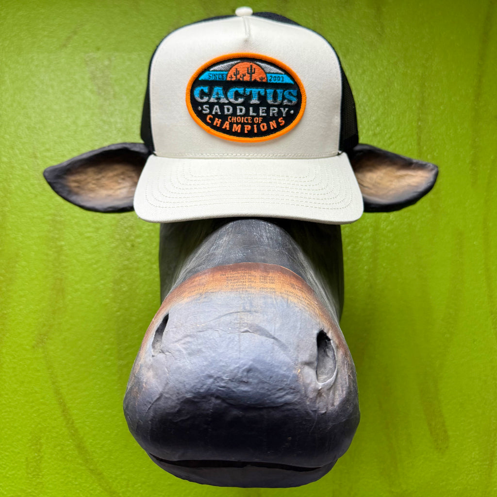 Cactus Saddlery cap mesh trucker hat in tan and black, breathable mesh back promotes airflow, with adjustable snapback closure for a custom fit - RDHC587. Available at Blair's Western Wear, Marble Falls, TX.