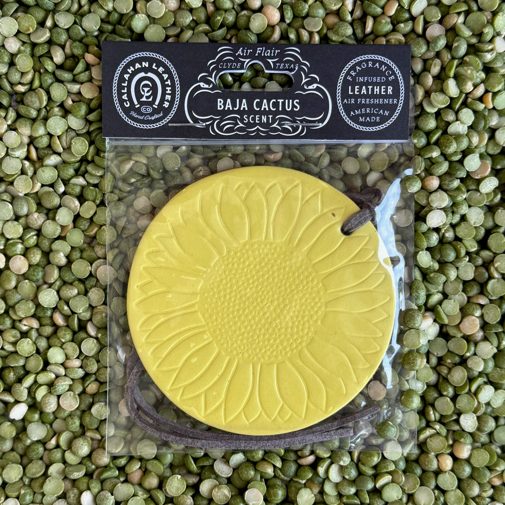 Callahan Leather Air Flair Sunflower in yellow, infused with crisp Baja Cactus fragrance that refreshes naturally, made from durable full‑grain leather and equipped with a leather loop for easy hanging – AFRSFYLLBC. Available at Blair's Western Wear, Marble Falls, TX.