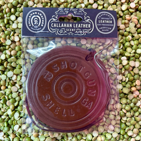 Callahan Leather air freshener round shotgun shell in brown leather, made from genuine leather for long-lasting scent, with fragrance-infused construction – AFRSGBRWLTH. Available at Blair's Western Wear, Marble Falls, TX.