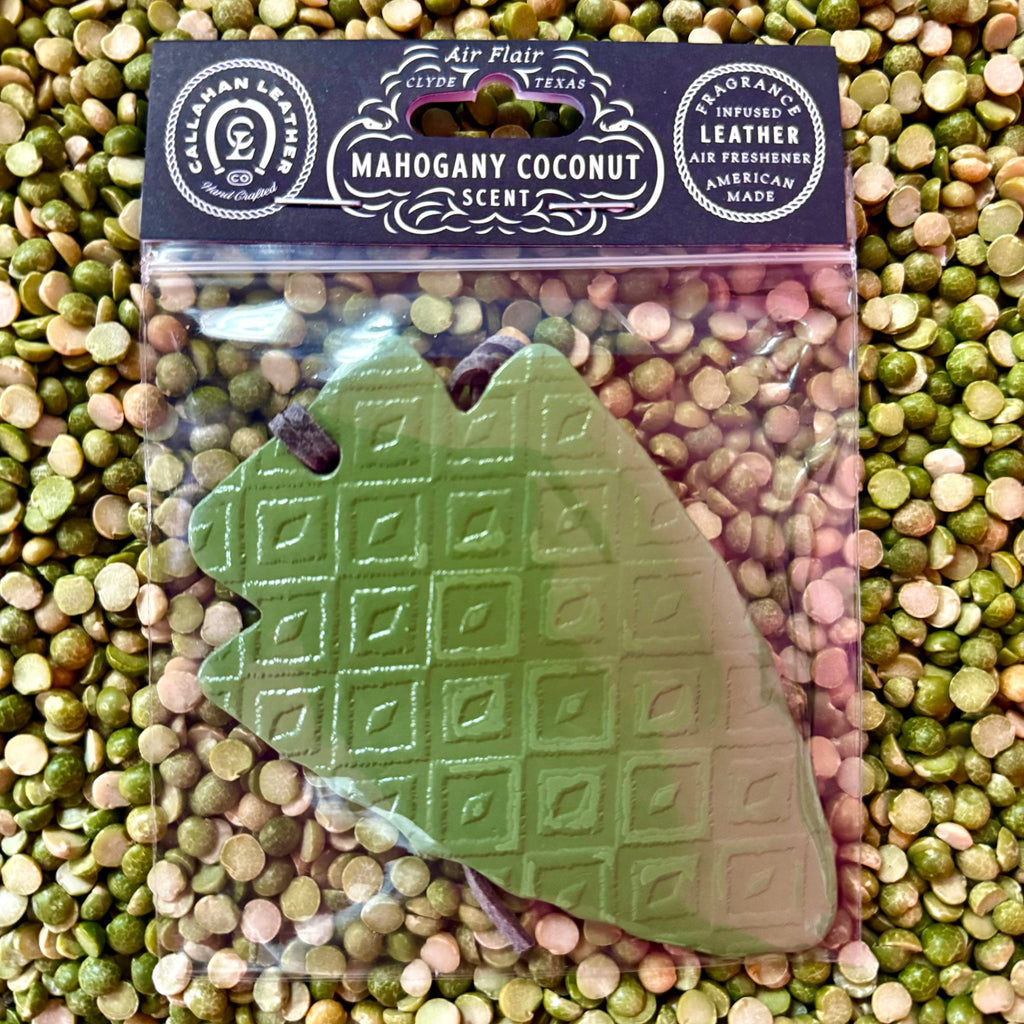 Callahan Leather air freshener arrowhead in olive, made from long-lasting fragrance-infused leather, with an embossed Western pattern for added style – AFARROWOLVMCAZT. Available at Blair's Western Wear, Marble Falls, TX.