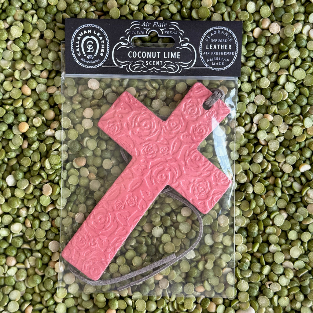 Callahan Leather Air Freshener Cross in Pink, handcrafted from full-grain leather infused with Coconut Lime fragrance, featuring embossed rose detailing - AFCROSSPNK. Available at Blair's Western Wear, Marble Falls, TX.