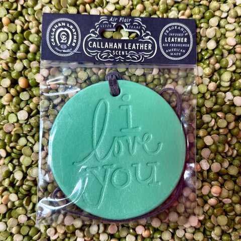 Callahan Leather air freshener round leather “I Love You” in seafoam, crafted from fragrance-infused leather, with a sturdy hanging cord – AFRDILYSFMLTHR. Available at Blair's Western Wear, Marble Falls, TX.