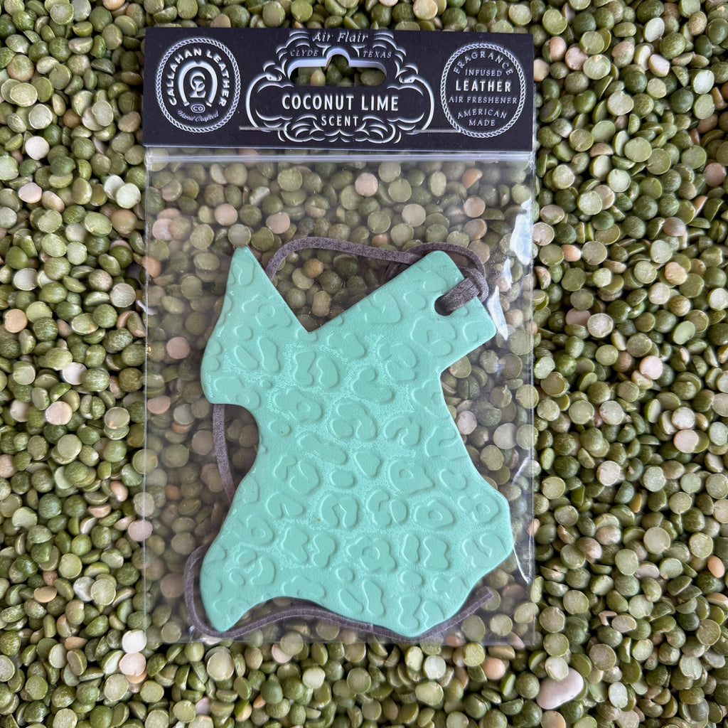 Callahan Leather Air Freshener in Turquoise Leopard, handcrafted from full-grain leather with a refreshing Coconut Lime scent, featuring a bold turquoise leopard print design, and equipped with an attached cord for easy hanging - AFTXSFMMCCHT. Available at Blair's Western Wear, Marble Falls, TX.
