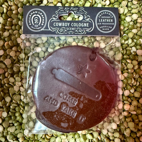 Callahan Leather Co. air freshener round leather Come and Take It in brown, infused with long-lasting Cowboy Cologne scent, with an embossed Texas-inspired design – AFRCATIBRWCC. Available at Blair's Western Wear, Marble Falls, TX.