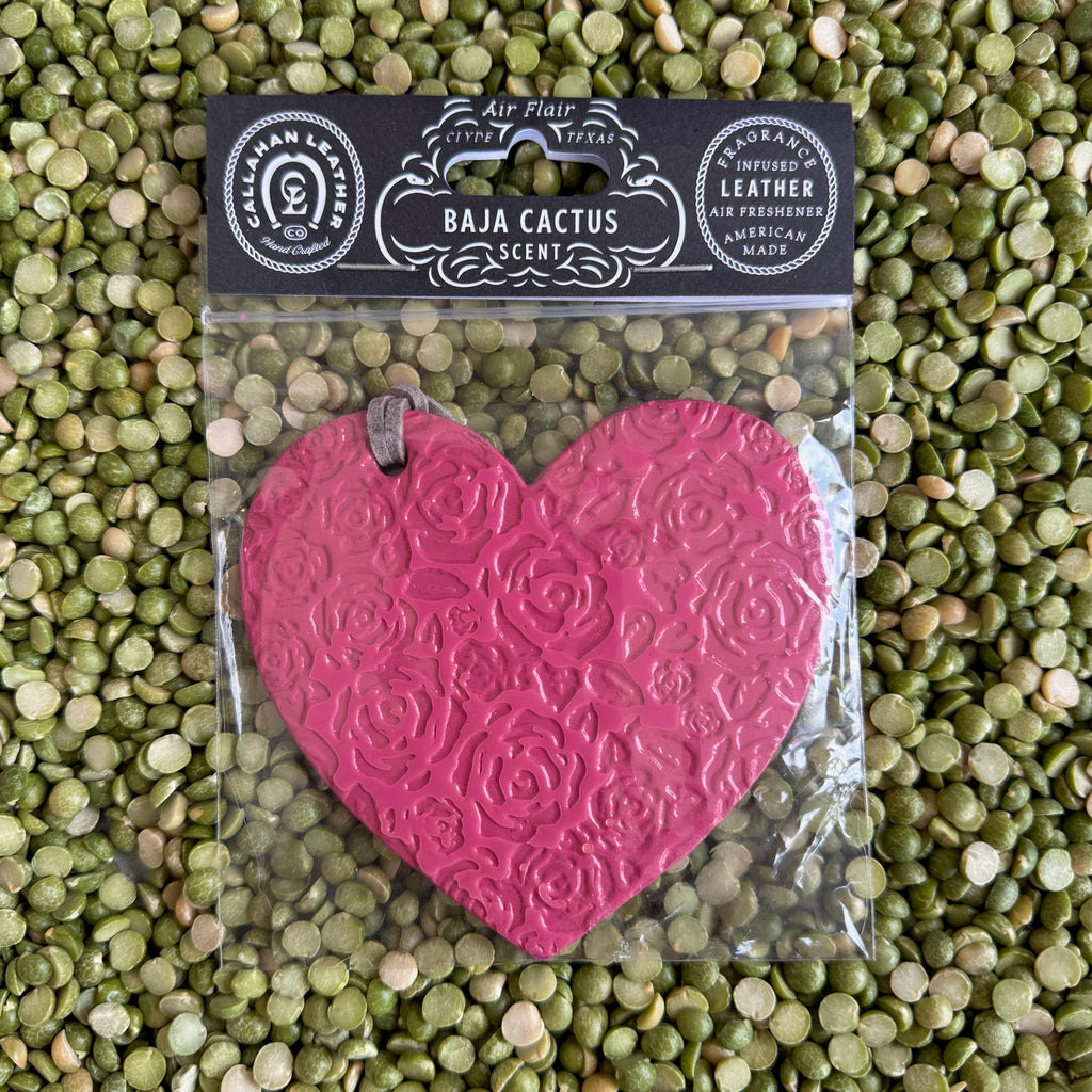 Callahan Leather Heart Air Freshener in Rose, handcrafted from full-grain vegetable-tanned leather infused with Baja Cactus scent, featuring an embossed rose design for added elegance - AFHRTFCHBC. Available at Blair's Western Wear, Marble Falls, TX.