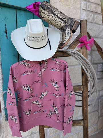 Girl's Ariat Sweatshirt - 10062847 - This cute, pink, quarter zip sweatshirts features a pocket in the center with the cutest western pattern all around that includes cowgirls riding around the desert. Available at Blair's Western Wear located in Marble Falls. 