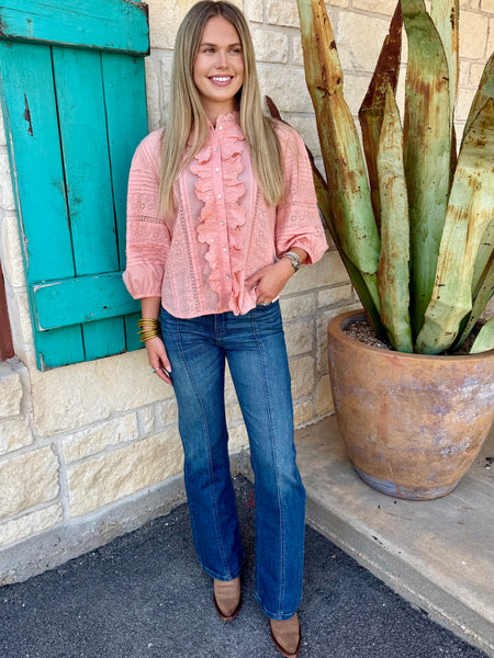 Women's dark wash Cruel Girl front seam trouser jean styled with peach eyelet top and western boots, full outfit front view — Blair's Western Wear Marble Falls TX