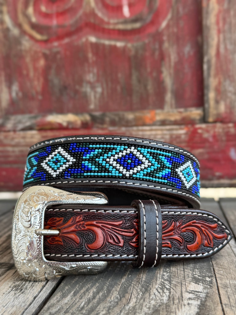 Kids Aztec Beaded Tooled Leather Belt -  XIBB101K - This kid's western belt pairs genuine hand-tooled leather with a bold Aztec-inspired beaded inlay in cobalt blue, turquoise, and white — finished with a classic engraved silver buckle. Available at Blair's Western Wear located in Marble Falls TX 