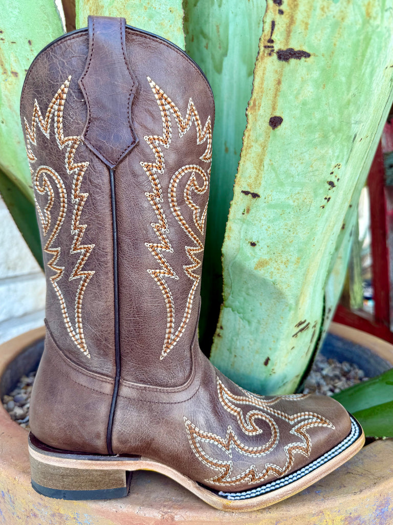 Kids Corral western boot leather square toe in brown, with flame embroidery on the shaft and durable double-stitched welt construction for lasting wear – T0238. Available at Blair’s Western Wear, Marble Falls, TX.