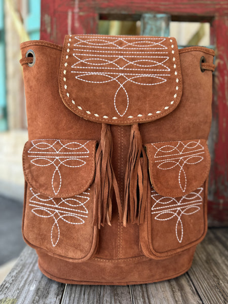 Ladies American Darling Backpack in tan suede, soft suede body with fringe accents, and contrast white embroidery detailing - ADBG1624C. Available at Blair's Western Wear, Marble Falls, TX.
