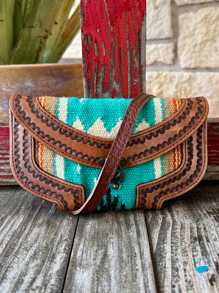 Ladies American Darling clutch blanket leather clutch in turquoise, featuring hand-tooled leather construction, with secure metal kiss-lock closure - ADBG829C. Available at Blair's Western Wear, Marble Falls, TX.