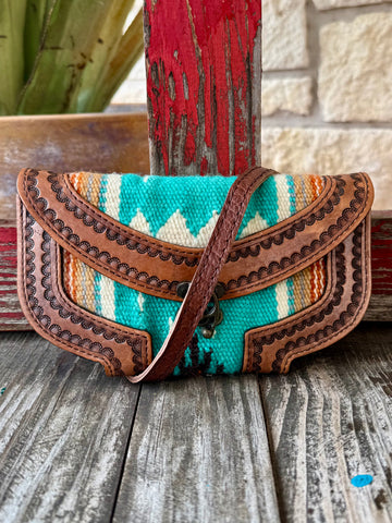 Ladies American Darling clutch blanket leather clutch in turquoise, featuring hand-tooled leather construction, with secure metal kiss-lock closure - ADBG829C. Available at Blair's Western Wear, Marble Falls, TX.