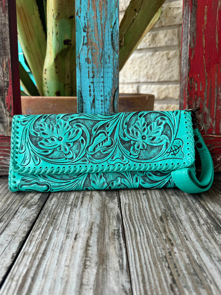 Ladies American Darling Wristlet Leather Tooling in Turquoise, hand-tooled floral leather exterior for long-lasting durability, with detachable wrist strap for hands-free carry - ADBG1106A. Available at Blair's Western Wear, Marble Falls, TX.