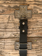 Black genuine leather belt with deep floral tooling and oversized cross-shaped silver conchos featuring Aztec-inspired engraving, a beaded rope border, and a diamond center stone. A bold western statement piece for any occasion.

Available at Blair's Western Wear, Marble Falls, TX